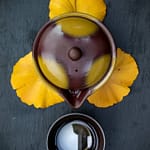 Tea Passion_Sven-Christian Lange_Branding Photography_Japanese Ginko Gaiwan Arrangement_Brown And Yellow_Tea Bowl_On Grey Slate Tray_Green Tea_Tea Ceremony_Wabi Sabi