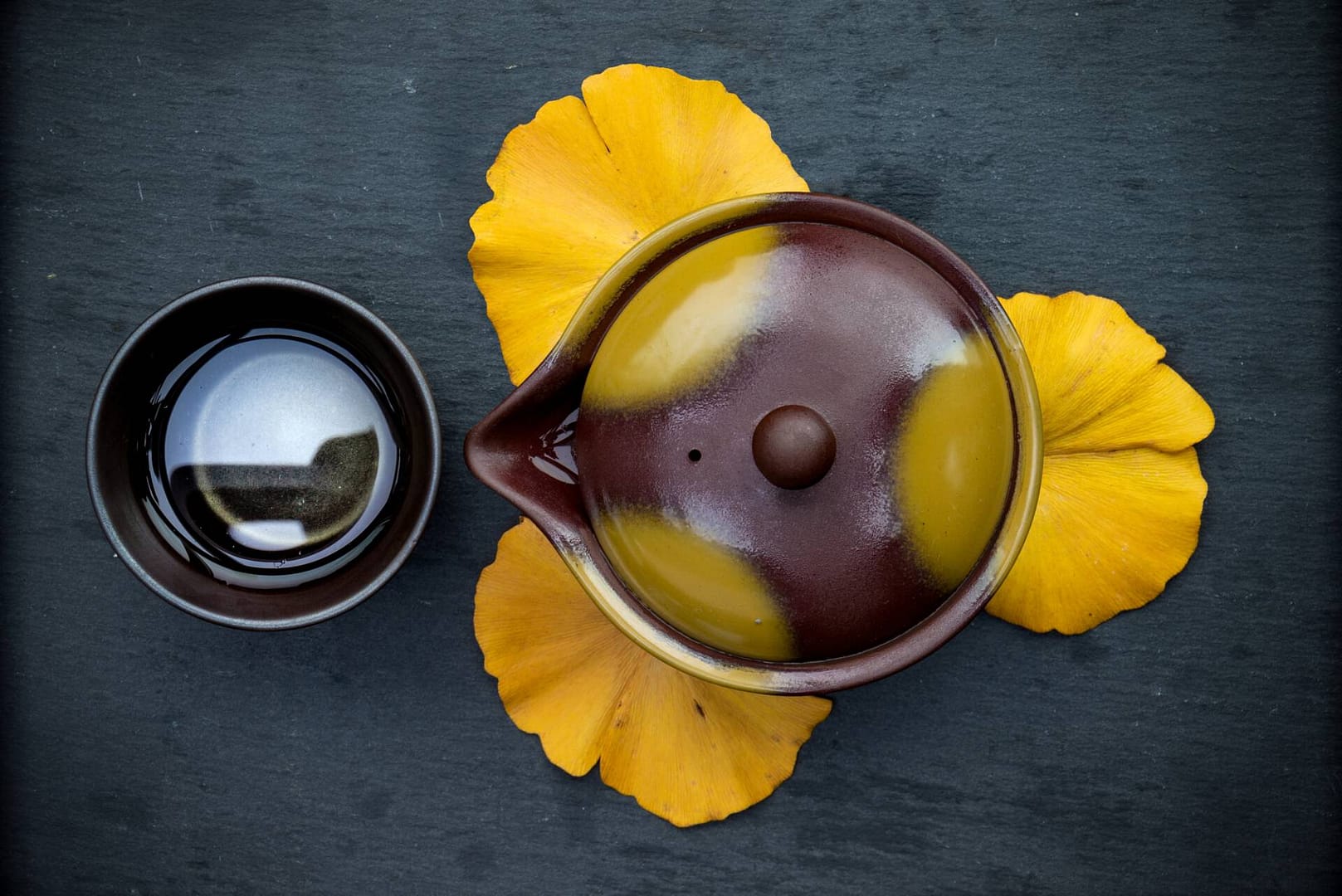 Tea Passion_Sven-Christian Lange_Branding Photography_Japanese Ginko Gaiwan Arrangement_Brown And Yellow_Tea Bowl_On Grey Slate Tray_Green Tea_Tea Ceremony_Wabi Sabi